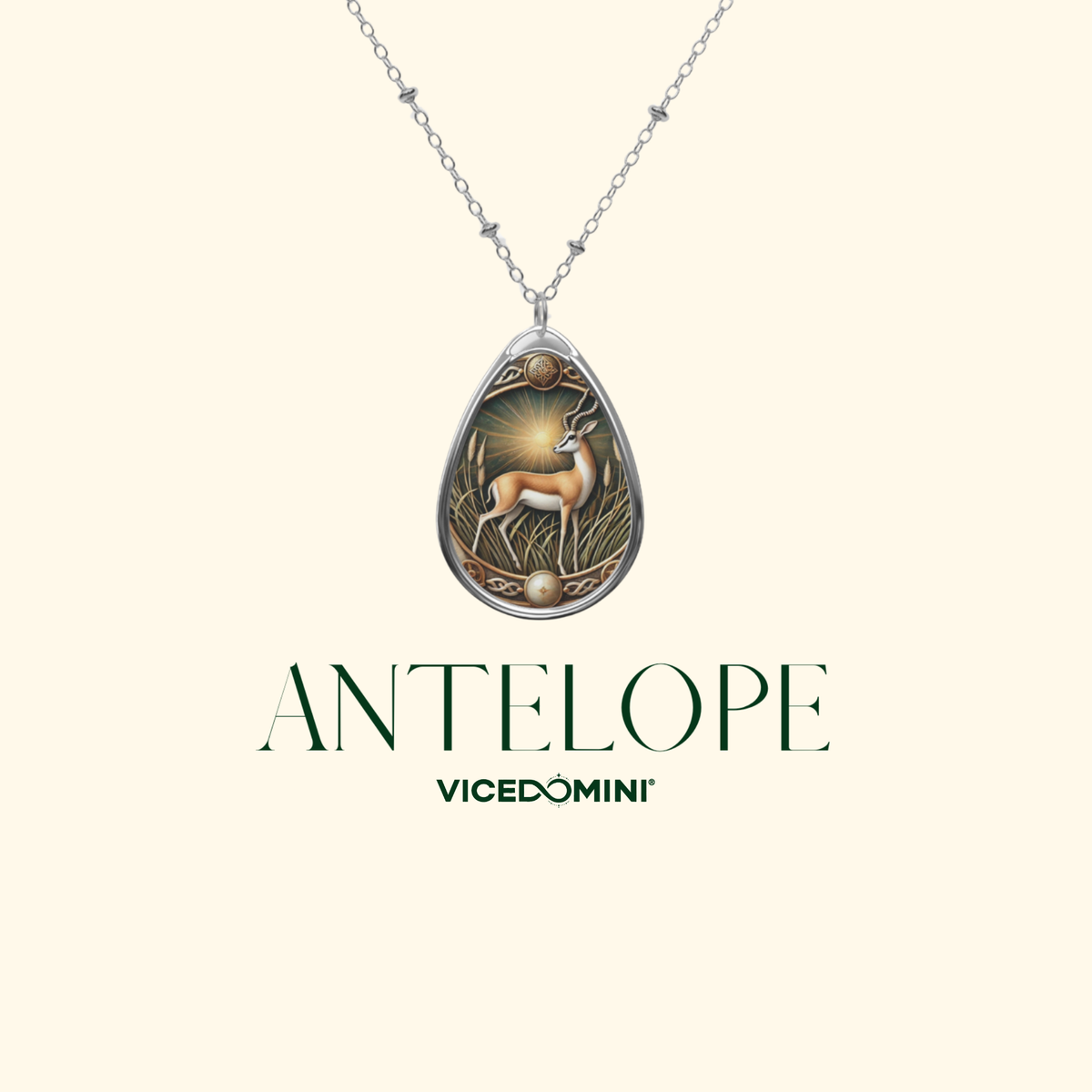 A silver-toned teardrop pendant necklace featuring an embossed scorpion design with gold and bronze detailing, shown against a light cream background with the text 'SCORPION' and 'VICEDOMINI' below.