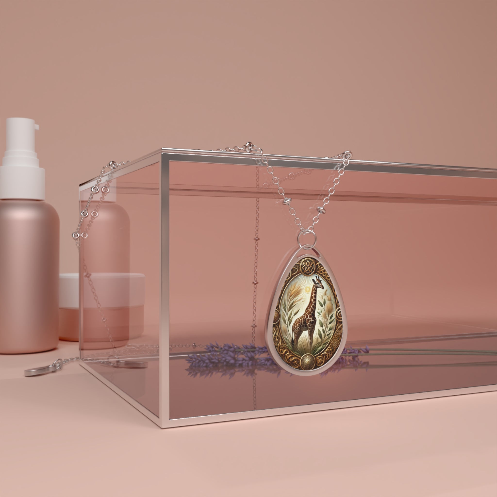 A giraffe spirit animal necklace displayed on a pink glass box with lavender accents and soft peach background. The pendant features intricate details of a giraffe surrounded by golden and earthy tones.