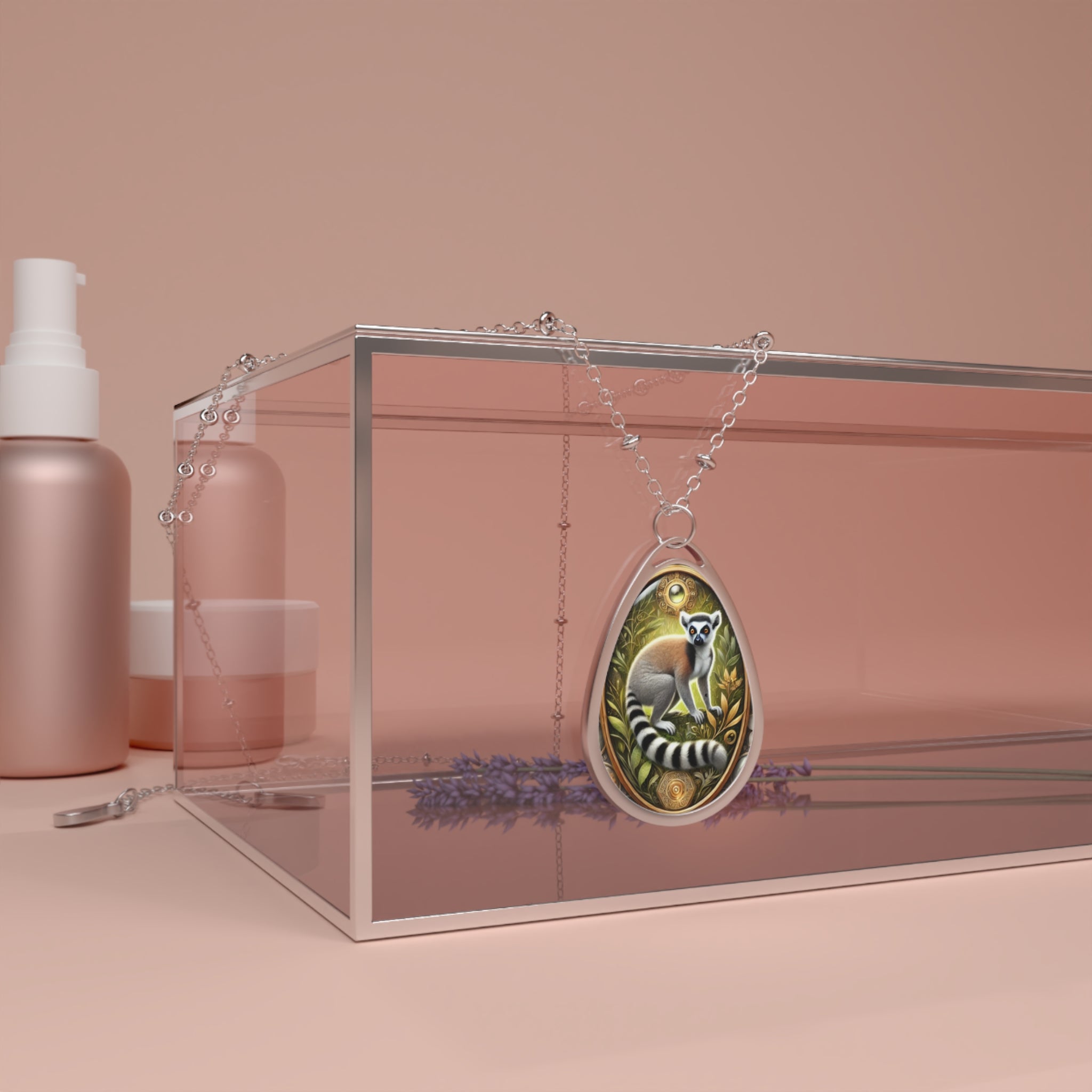 A stunning silver pendant with a finely detailed lemur motif rests against a glass jewelry box, surrounded by soft pink and gold tones. The intricate design includes swirling golden patterns, evoking a mystical and spiritual essence.