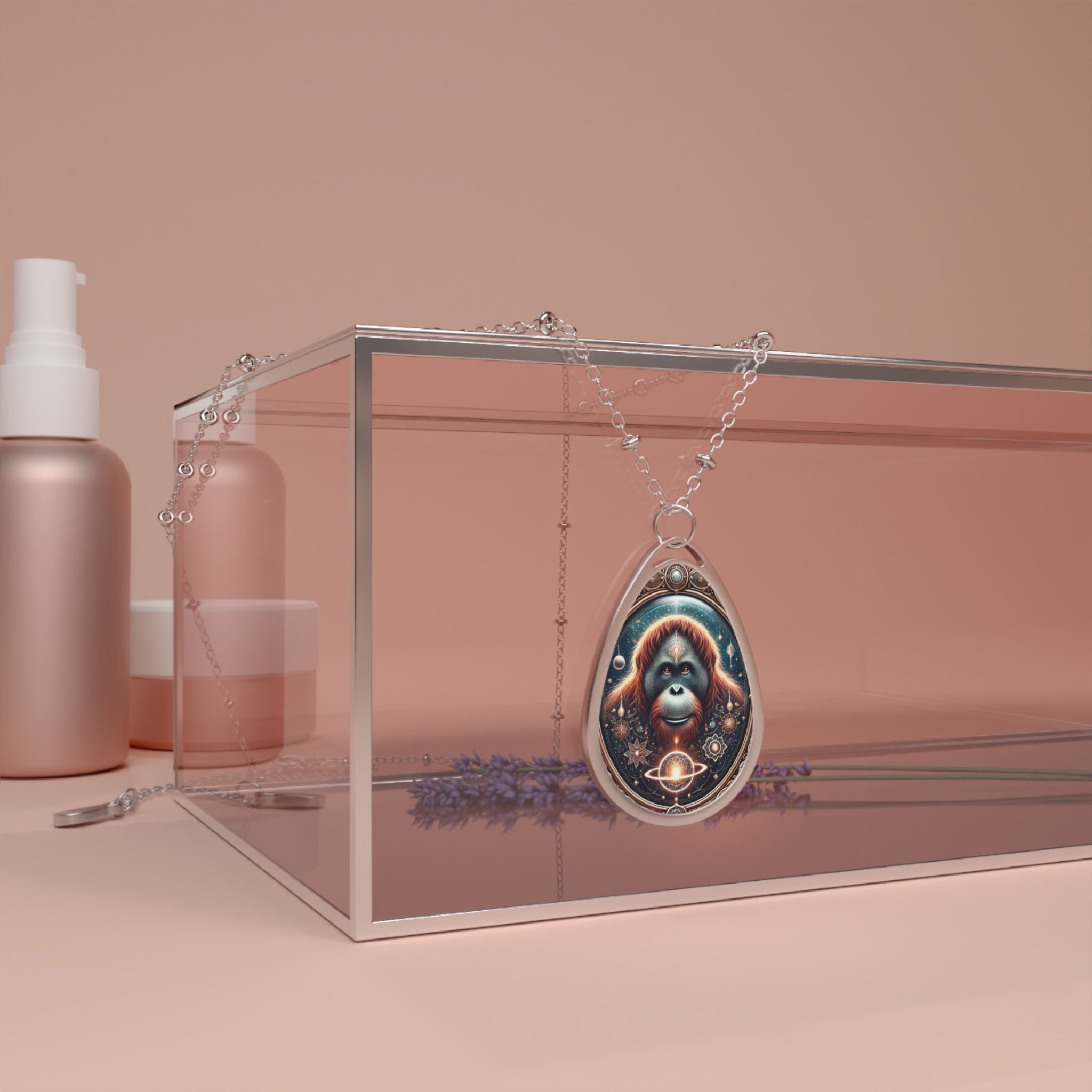 The pendant drapes over a transparent glass box, with skincare bottles and lavender flowers in the background. The orangutan design is highlighted with cosmic elements, intricate filigree, and warm earthy tones.