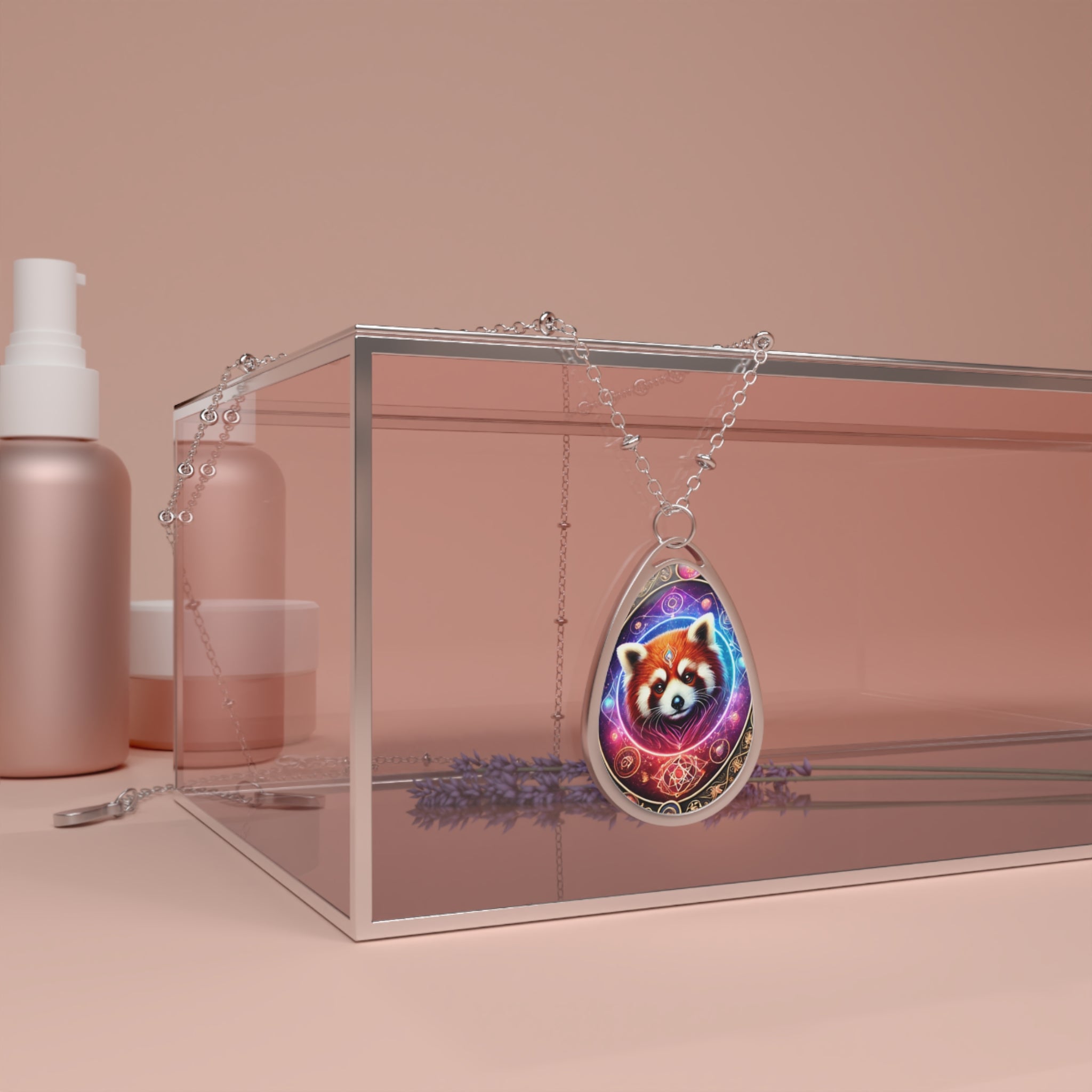 A red panda-themed pendant necklace draped over a transparent jewelry box with soft pink cosmetic bottles in the background. The pendant’s celestial artwork glows against the neutral tones of the setting.