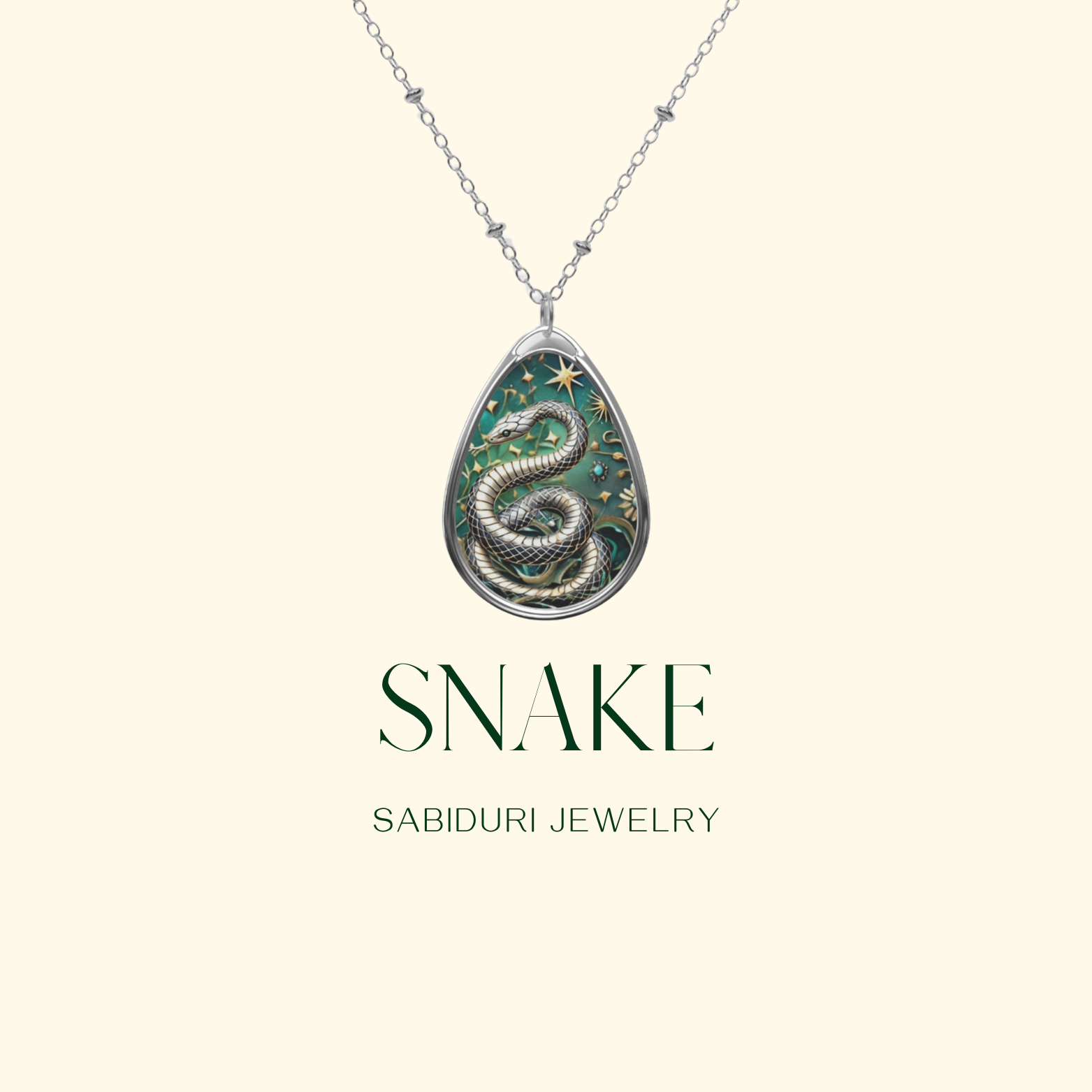 A close-up of a snake pendant necklace with a silver snake on a green and starry background, against a cream-colored backdrop. The text reads "Snake Sabiduri Jewelry," emphasizing the brand and product.