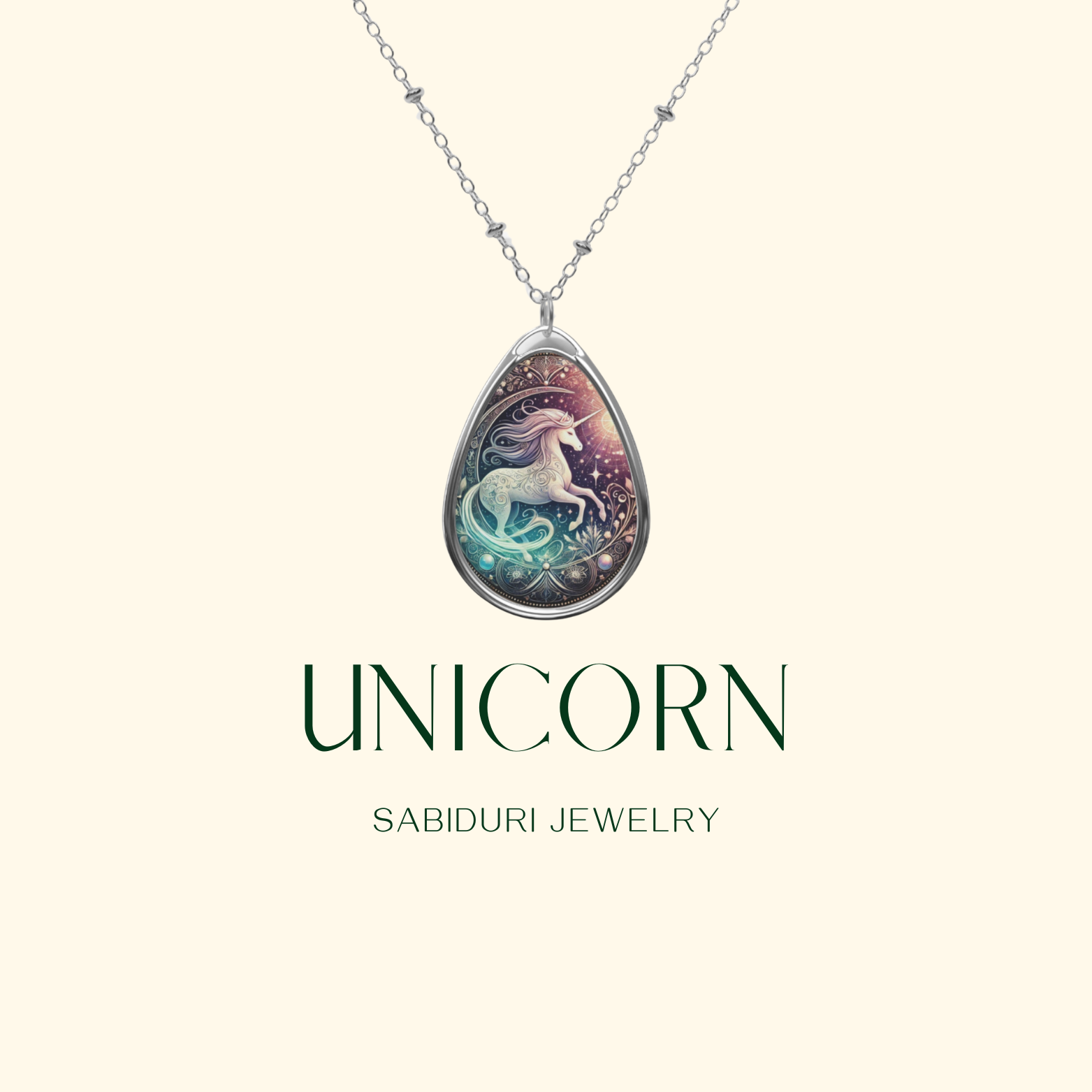 A silver necklace with a unicorn-themed pendant, adorned with golden filigree details, suspended against a clean, light-colored background. The text "UNICORN" and "SABIDURI JEWELRY" is displayed in a modern serif font.