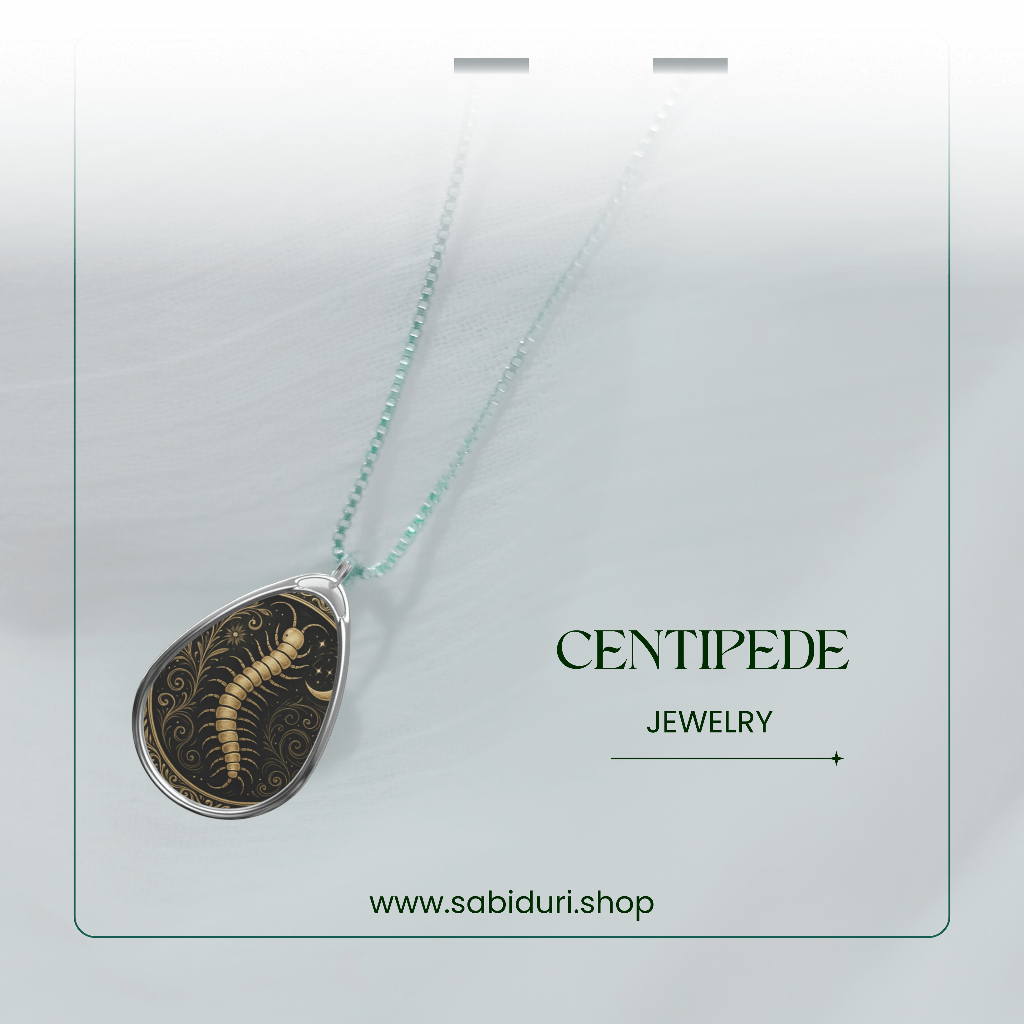 Elegant pendant necklace featuring a stylized golden centipede with swirling patterns, displayed on a white background with green accents and the word “CENTIPEDE JEWELRY.”