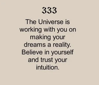 A beige background featuring "333" in bold, followed by the message: "The Universe is working with you on making your dreams a reality. Believe in yourself and trust your intuition."