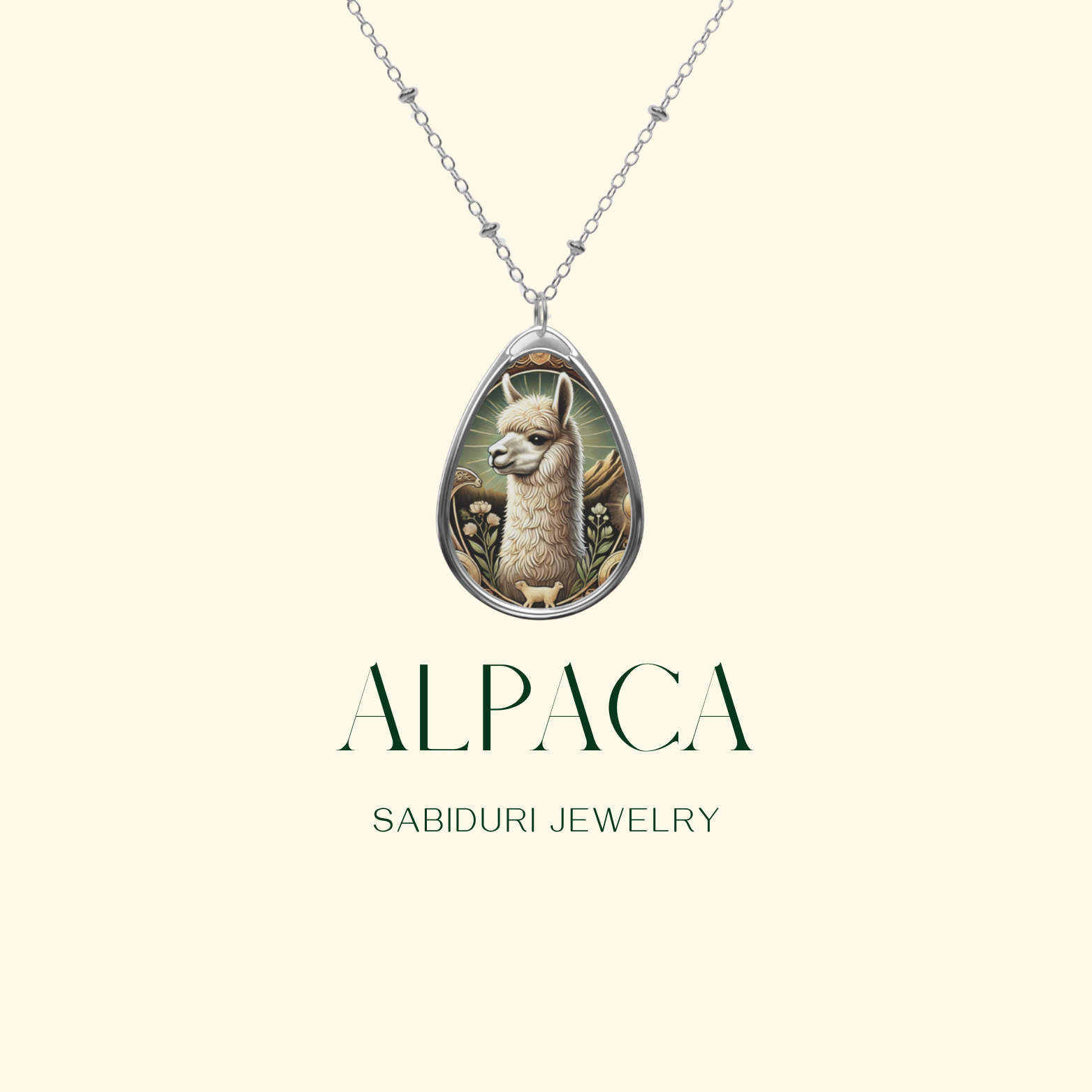 A delicate silver necklace with a teardrop-shaped pendant showcasing an alpaca with a serene expression, surrounded by intricate engravings and natural elements. The pendant is displayed on a neutral background, with the text "ALPACA" and "SABIDURI JEWELRY" elegantly positioned beneath.