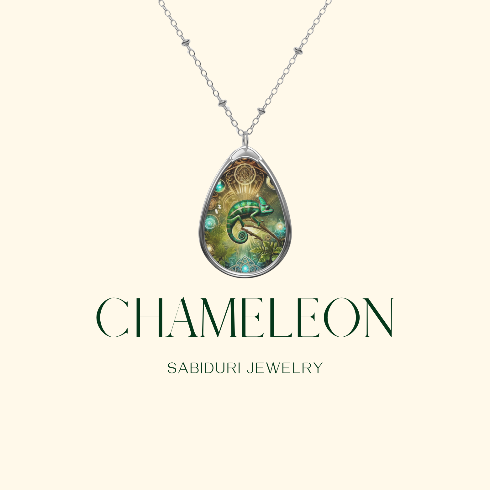 A high-resolution digital image of a chameleon necklace suspended from a silver chain, set against a clean, minimalist cream background. The pendant’s intricate design features a luminous green chameleon with delicate golden details, with "Chameleon" and "Sabiduri Jewelry" elegantly printed below.