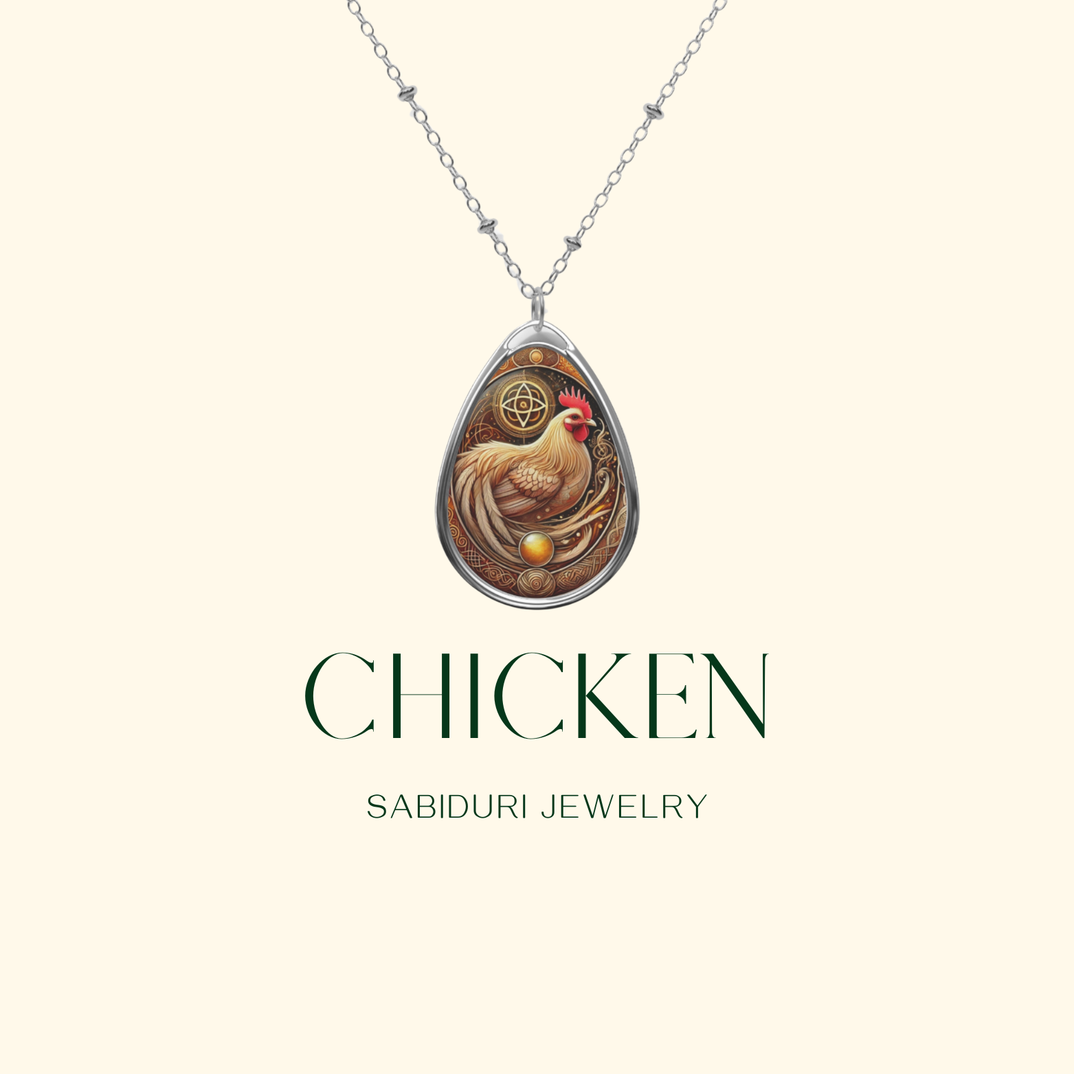 A minimalist presentation of the cormorant necklace against a soft cream background. The pendant, featuring a black cormorant framed by golden swirls and blue accents, hangs from a silver chain. Below it, "CORMORANT" and "SABIDURI JEWELRY" are written in an elegant font.