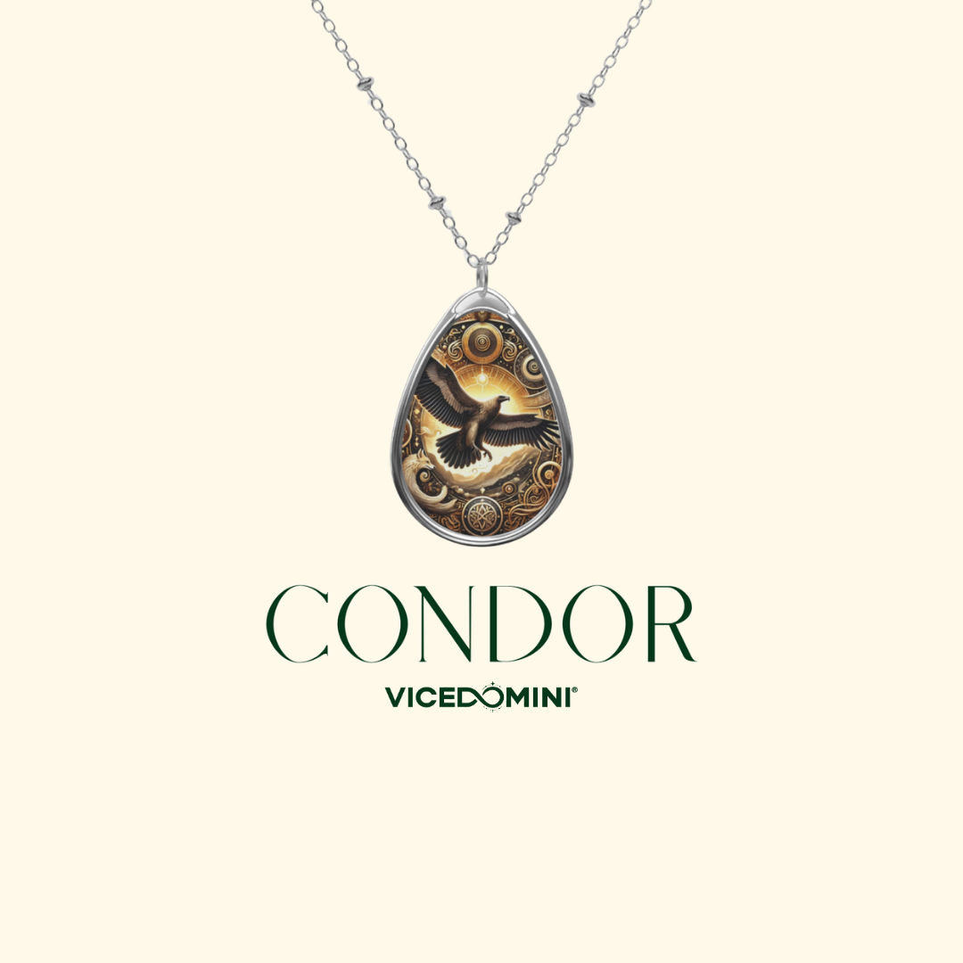 A teardrop-shaped pendant necklace with a silver-toned chain, featuring a detailed illustration of a condor in flight over ornate gold and brown patterns. The pendant is displayed on a light cream background with the brand name 'CONDOR' and sub-brand 'VICEDOMINI' printed below.