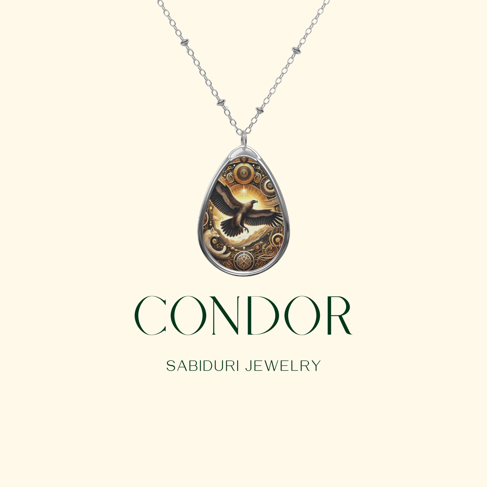 A minimalist presentation of the cormorant necklace against a soft cream background. The pendant, featuring a black cormorant framed by golden swirls and blue accents, hangs from a silver chain. Below it, "CORMORANT" and "SABIDURI JEWELRY" are written in an elegant font.