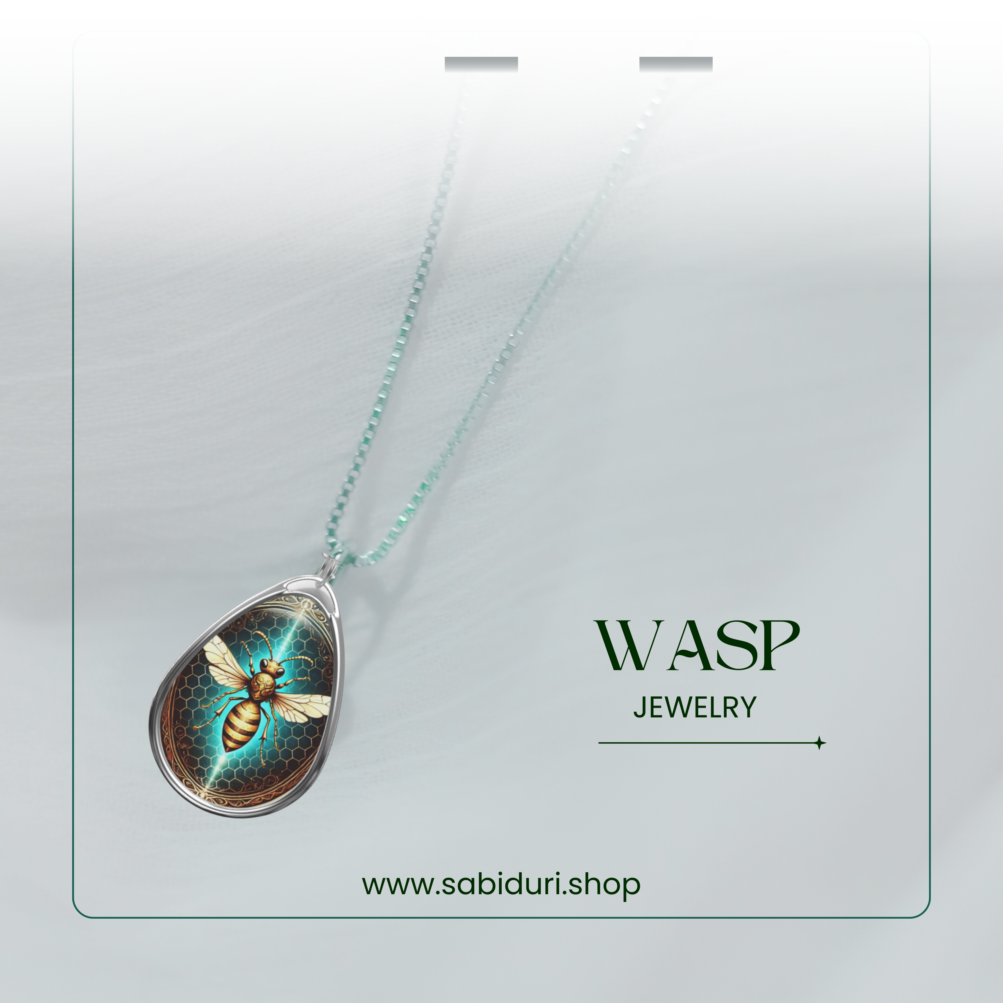 A wasp pendant necklace draped over a soft, white fabric. The pendant's glowing blue and gold honeycomb design contrasts against the muted background, with ‘WASP JEWELRY’ and a subtle website link below.