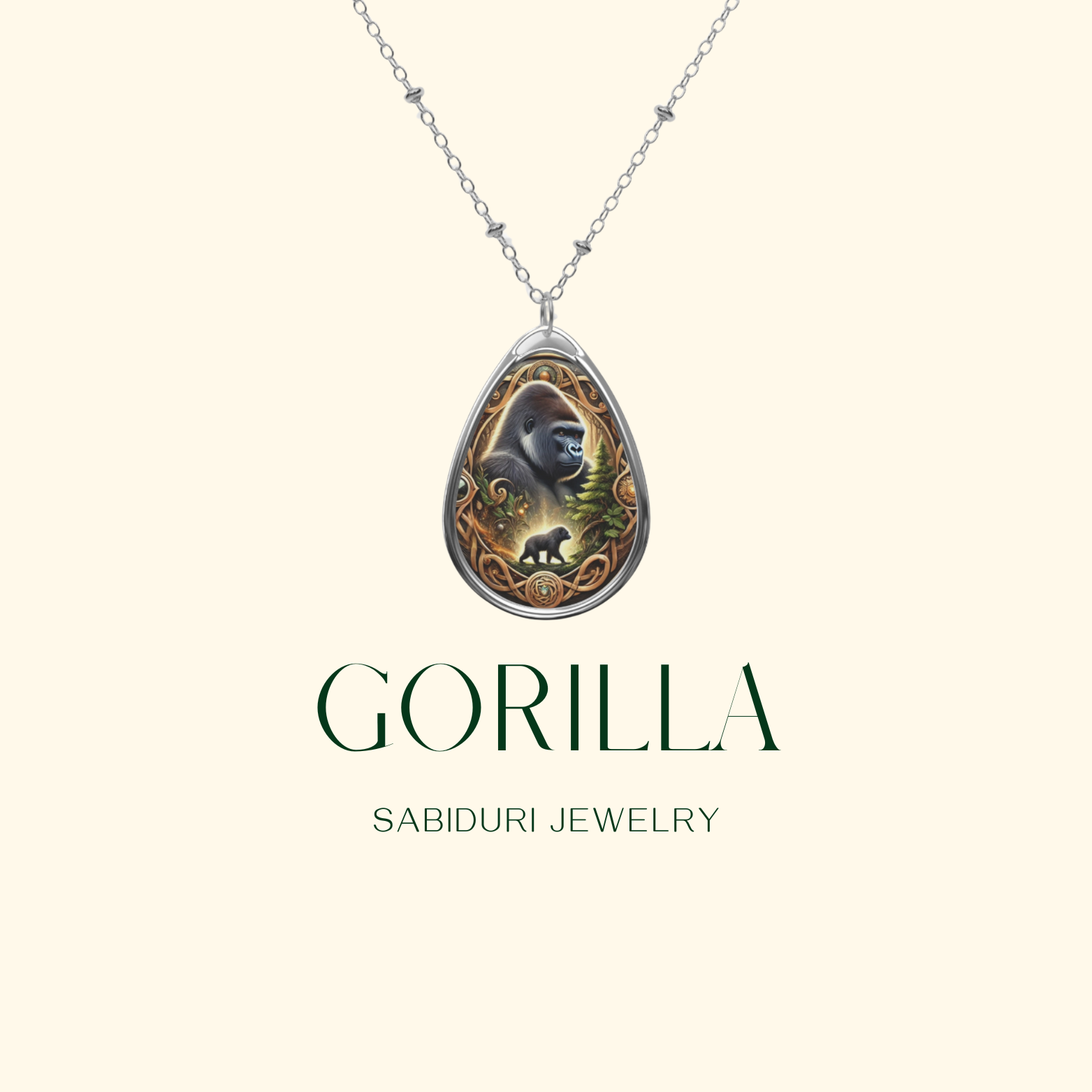 A digital mockup of the gorilla spirit animal necklace against a cream-colored background. The pendant, adorned with intricate golden and green swirls, features a detailed gorilla illustration. The text "GORILLA" and "SABIDURI JEWELRY" is elegantly displayed below.