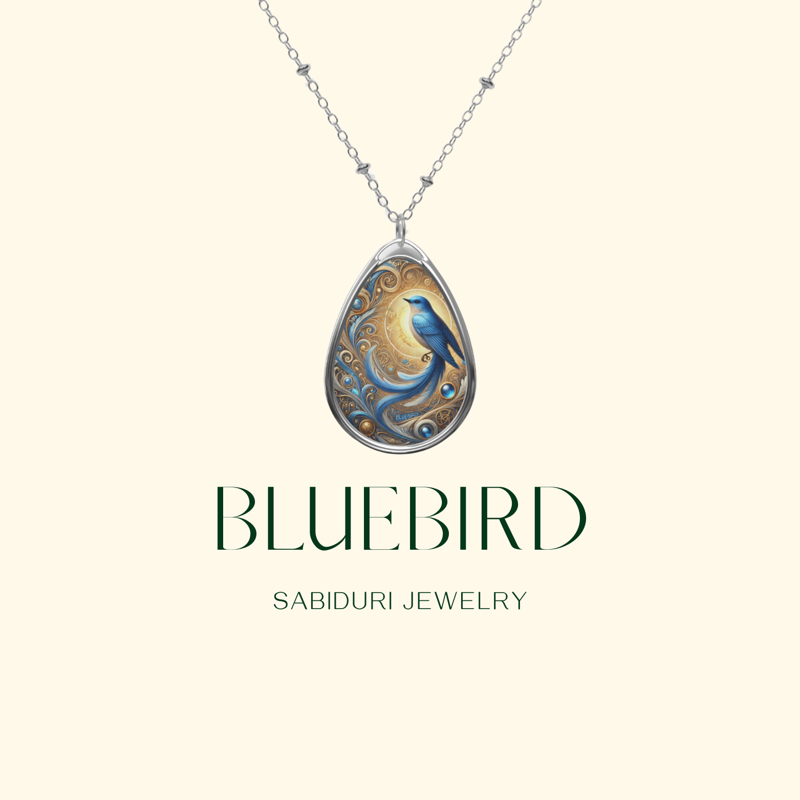 A minimalistic product showcase of the bluebird necklace, suspended against a light cream background. The pendant’s delicate silver chain extends upward, while the words "BLUEBIRD" and "SABIDURI JEWELRY" are elegantly displayed in green serif font below.