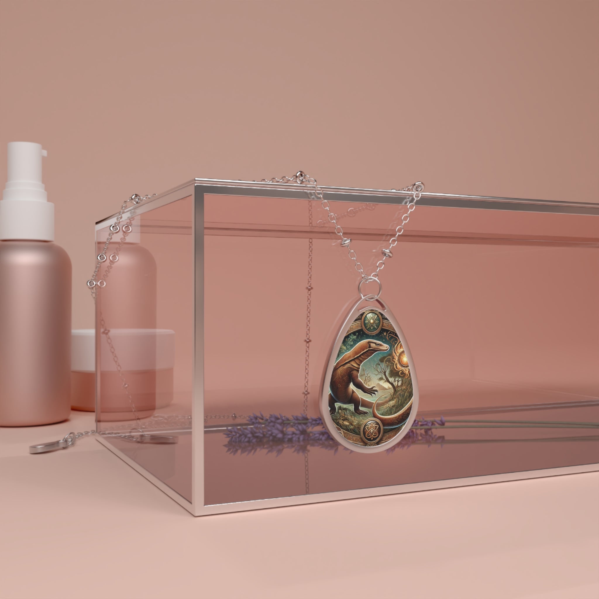 A Komodo dragon-engraved pendant draped over a modern glass jewelry box, surrounded by a soft, pink-toned aesthetic with subtle decorative elements. The chain elegantly cascades down the edge, enhancing the pendant’s earthy and powerful symbolism.