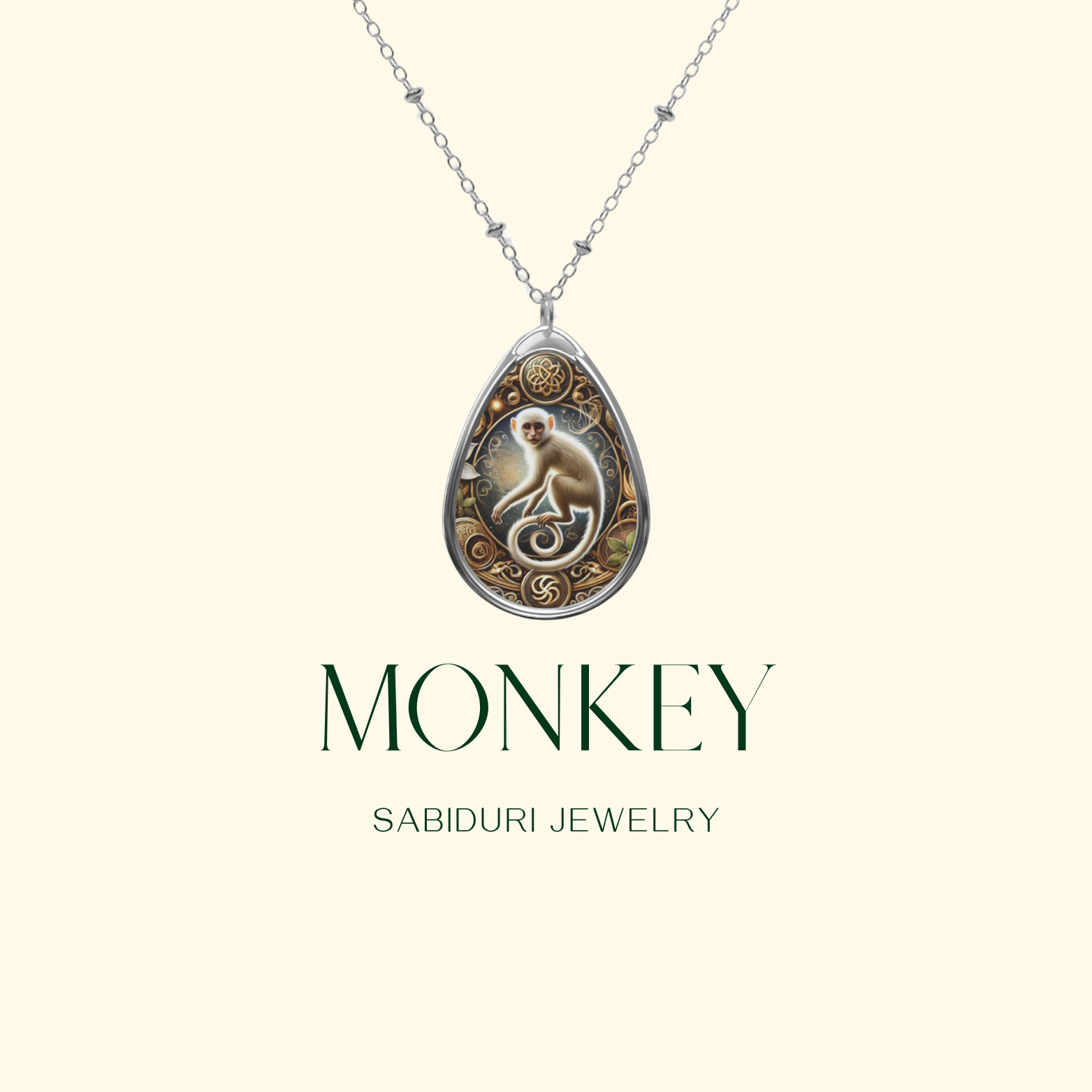 A silver chain necklace holding a detailed monkey-themed pendant, with the text "MONKEY" and "SABIDURI JEWELRY" displayed below on a soft cream-colored background. The pendant design showcases a monkey encircled by decorative patterns.