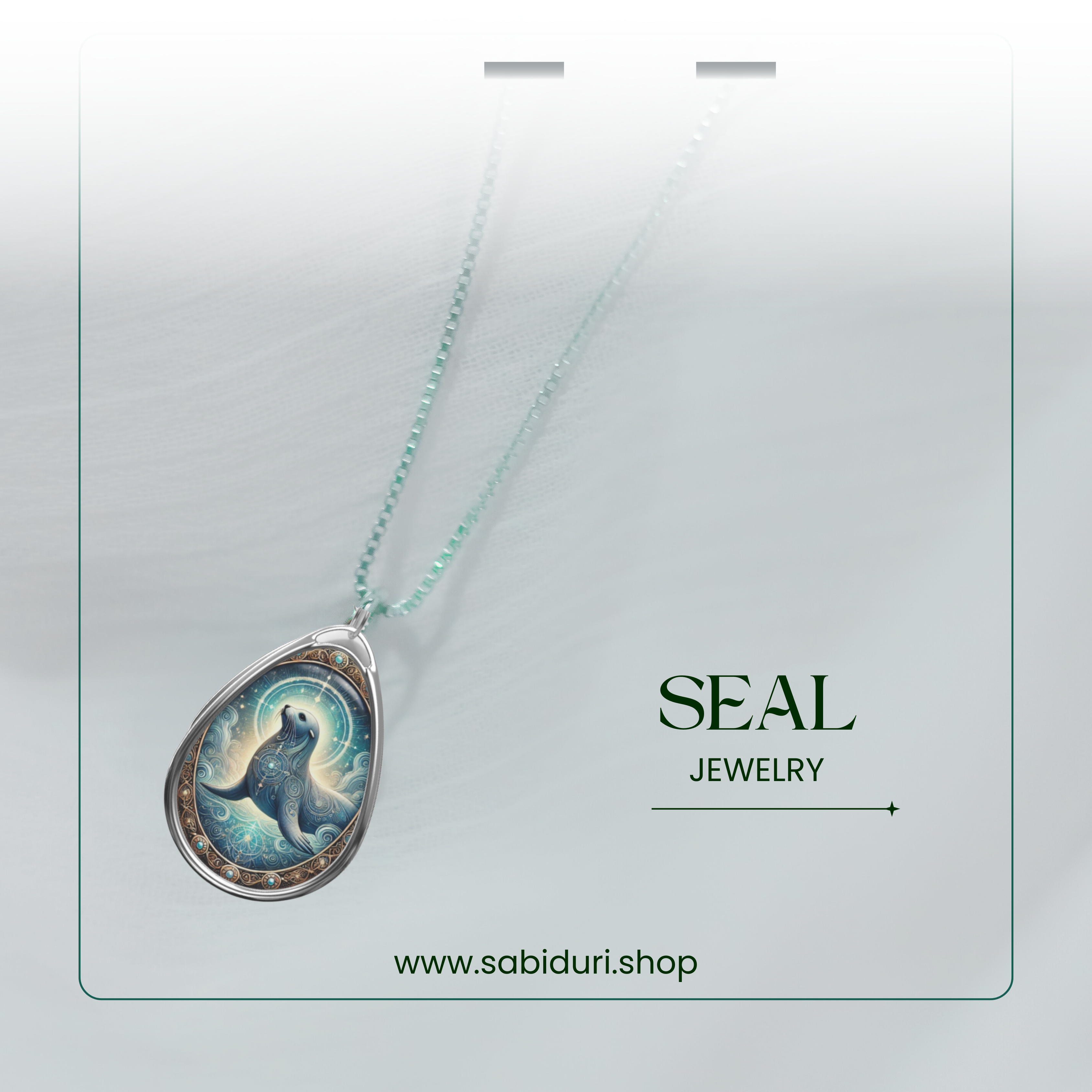 A mystical seal pendant necklace with a silver frame and delicate detailing, hanging from a beaded chain. The pendant design includes celestial and oceanic motifs, creating a luminous effect. The background is soft and airy, with the text "SEAL JEWELRY" and "www.sabiduri.shop" visible.