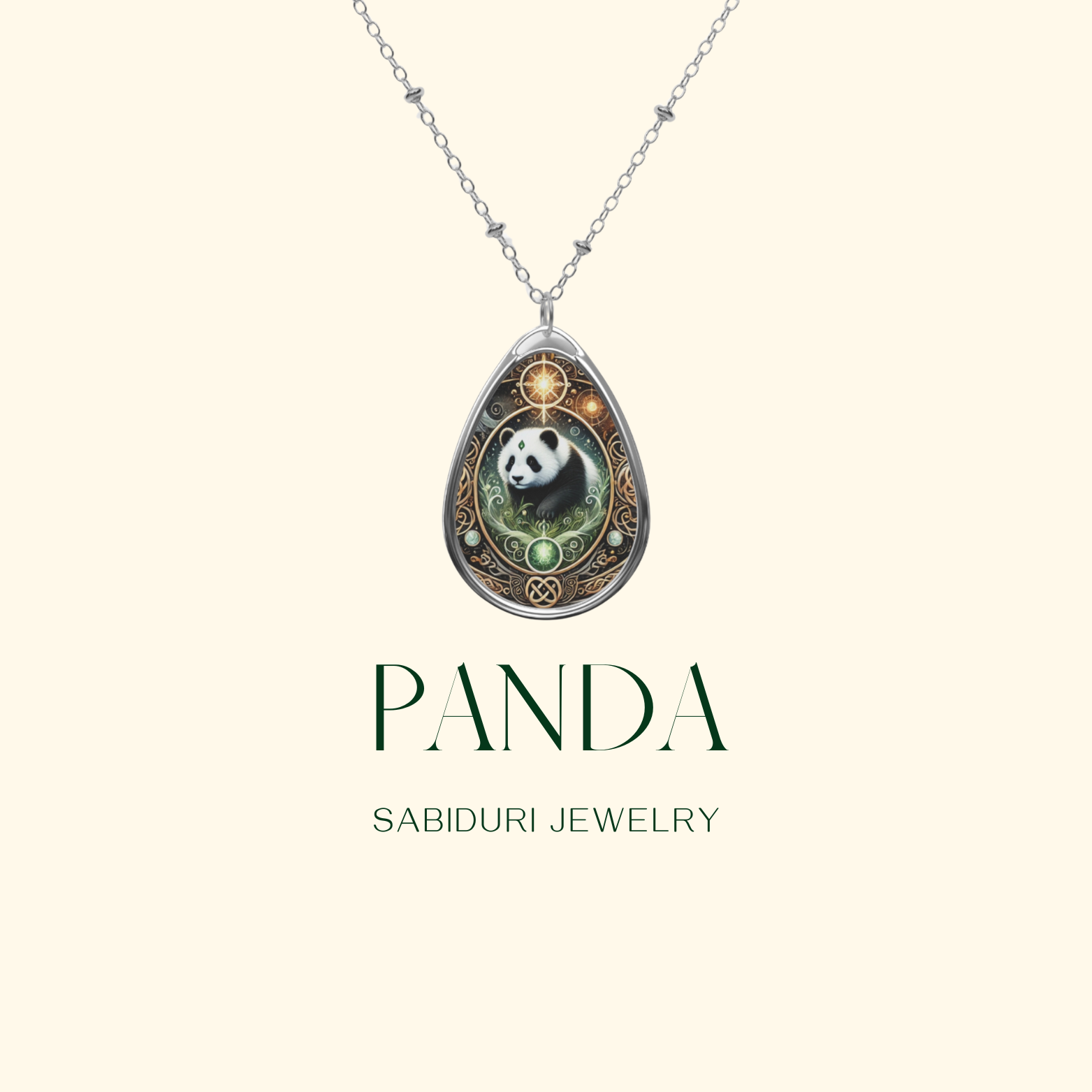 A silver chain necklace with a teardrop pendant showcasing a detailed panda design set against a green and gold ornamental background. The image has a minimalist beige backdrop with "PANDA" and "SABIDURI JEWELRY" in elegant dark green text.