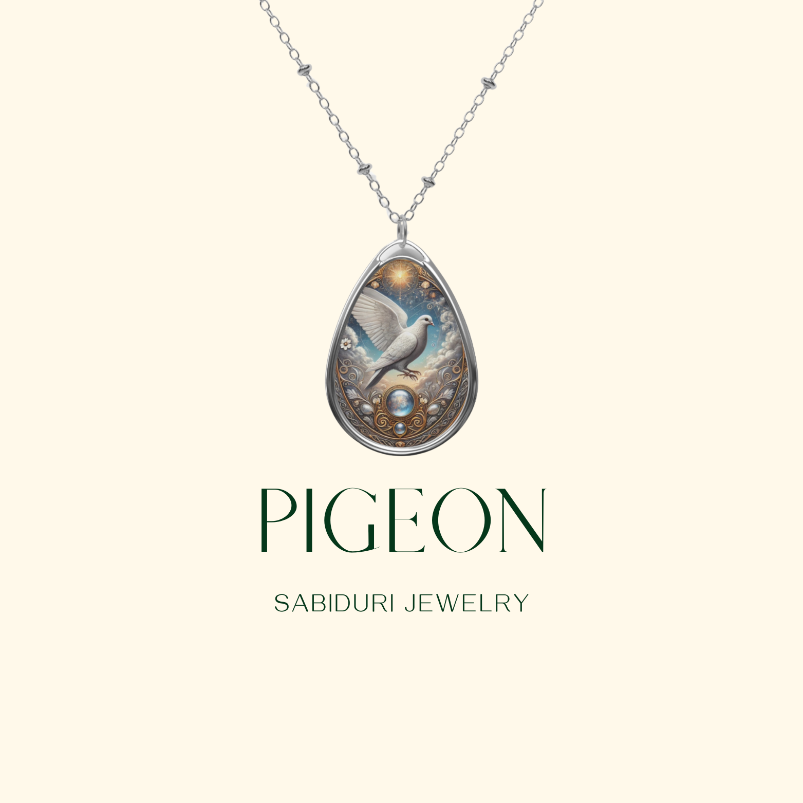 A teardrop-shaped pendant featuring an intricately designed pigeon with outstretched wings, surrounded by golden and blue ornate details. The necklace is displayed against a soft cream background with the text "PIGEON - SABIDURI JEWELRY" below.