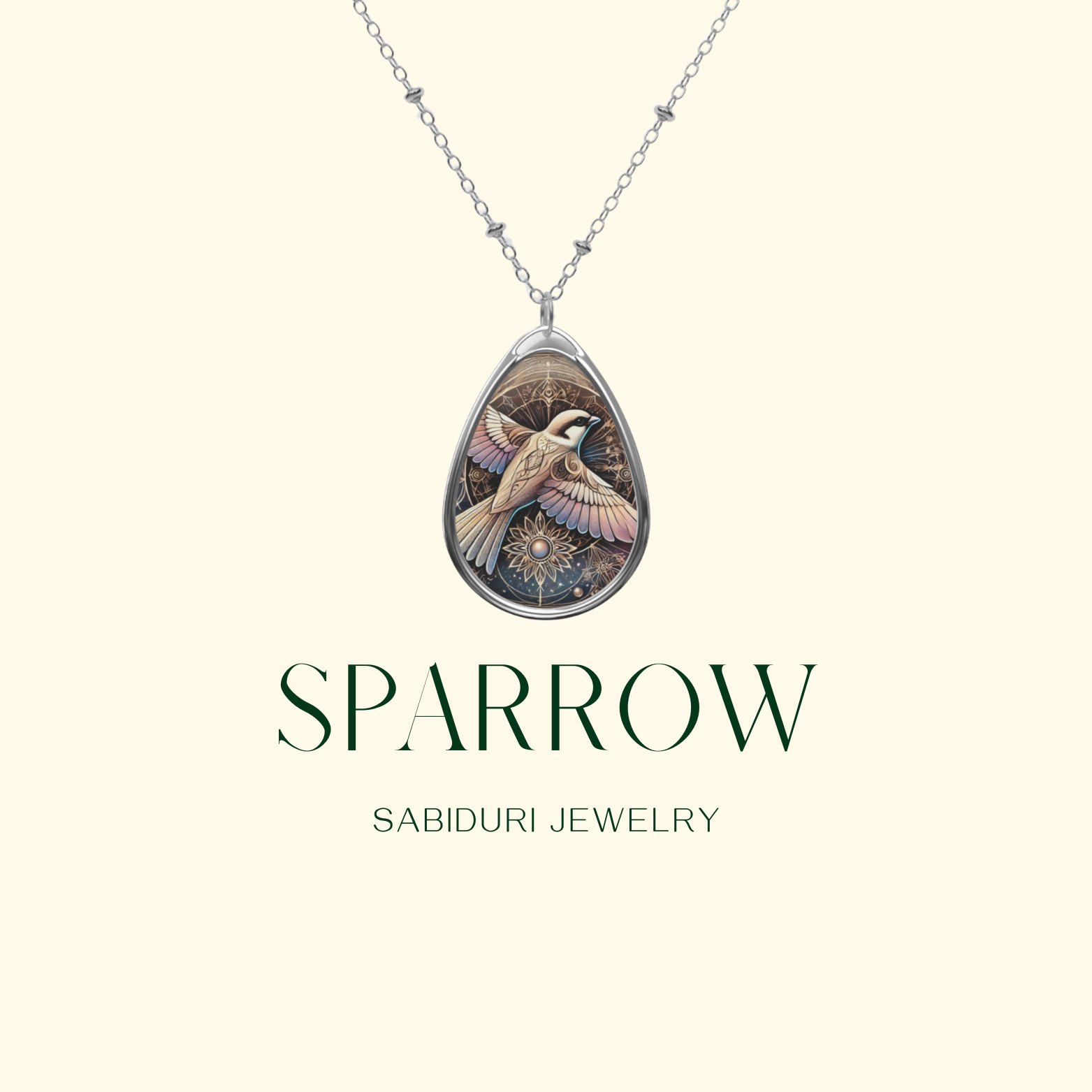 A close-up of the sparrow necklace against a soft cream background, showcasing the detailed artwork of the bird in mid-flight with ornate golden embellishments. The words "SPARROW" and "SABIDURI JEWELRY" are displayed in elegant typography.