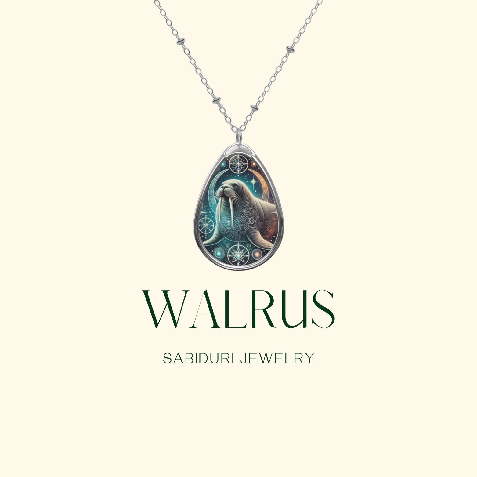 A  close-up of the walrus necklace suspended on a delicate silver chain against a minimalist cream background. The pendant features an ornate walrus illustration with starry and swirling details, accompanied by the text 'WALRUS - SABIDURI JEWELRY'.