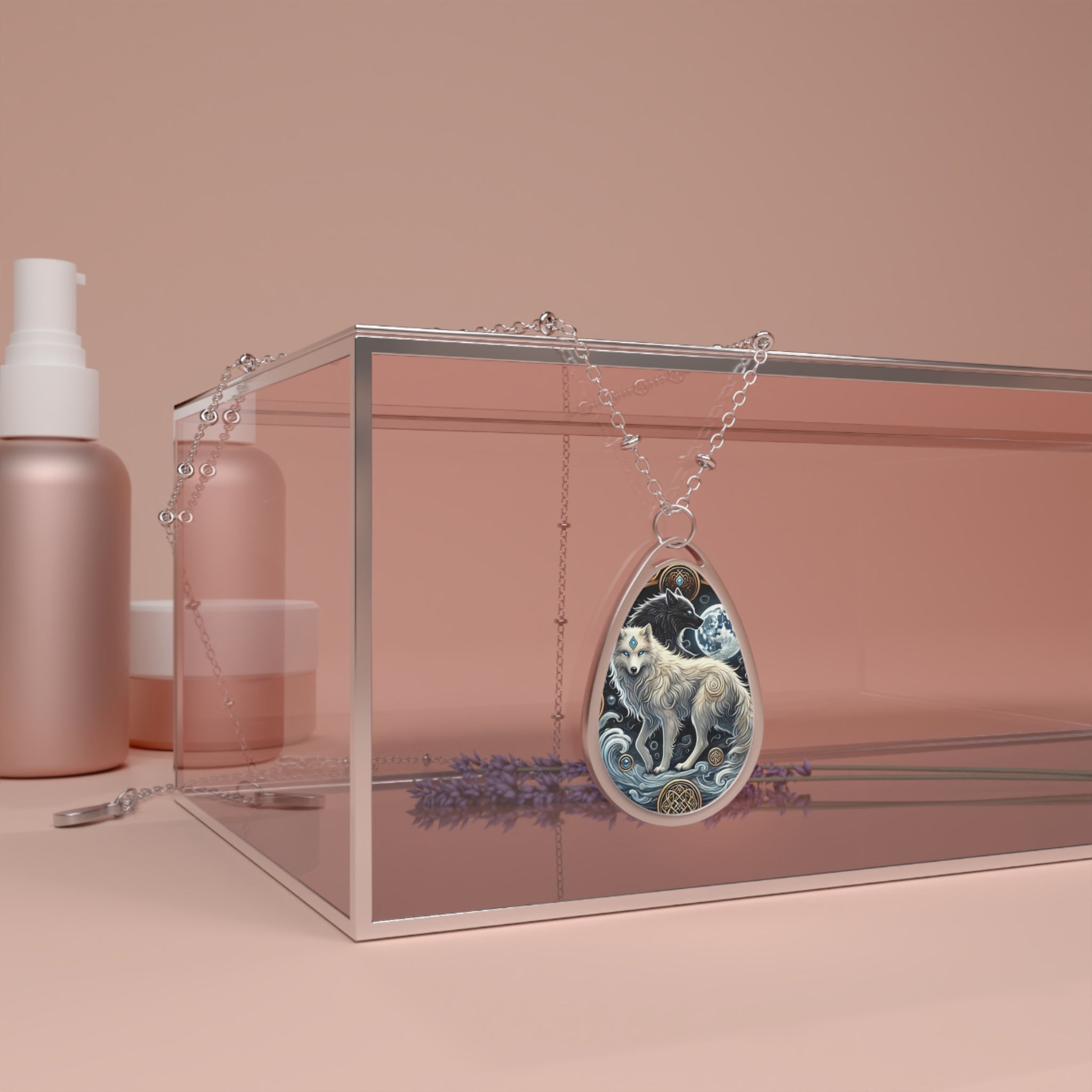 A silver necklace with a werewolf-themed pendant draped over a glass box. The pendant shows a detailed werewolf in front of a moonlit night scene. The display is set on a soft, peach-colored background with cosmetic bottles in the background.