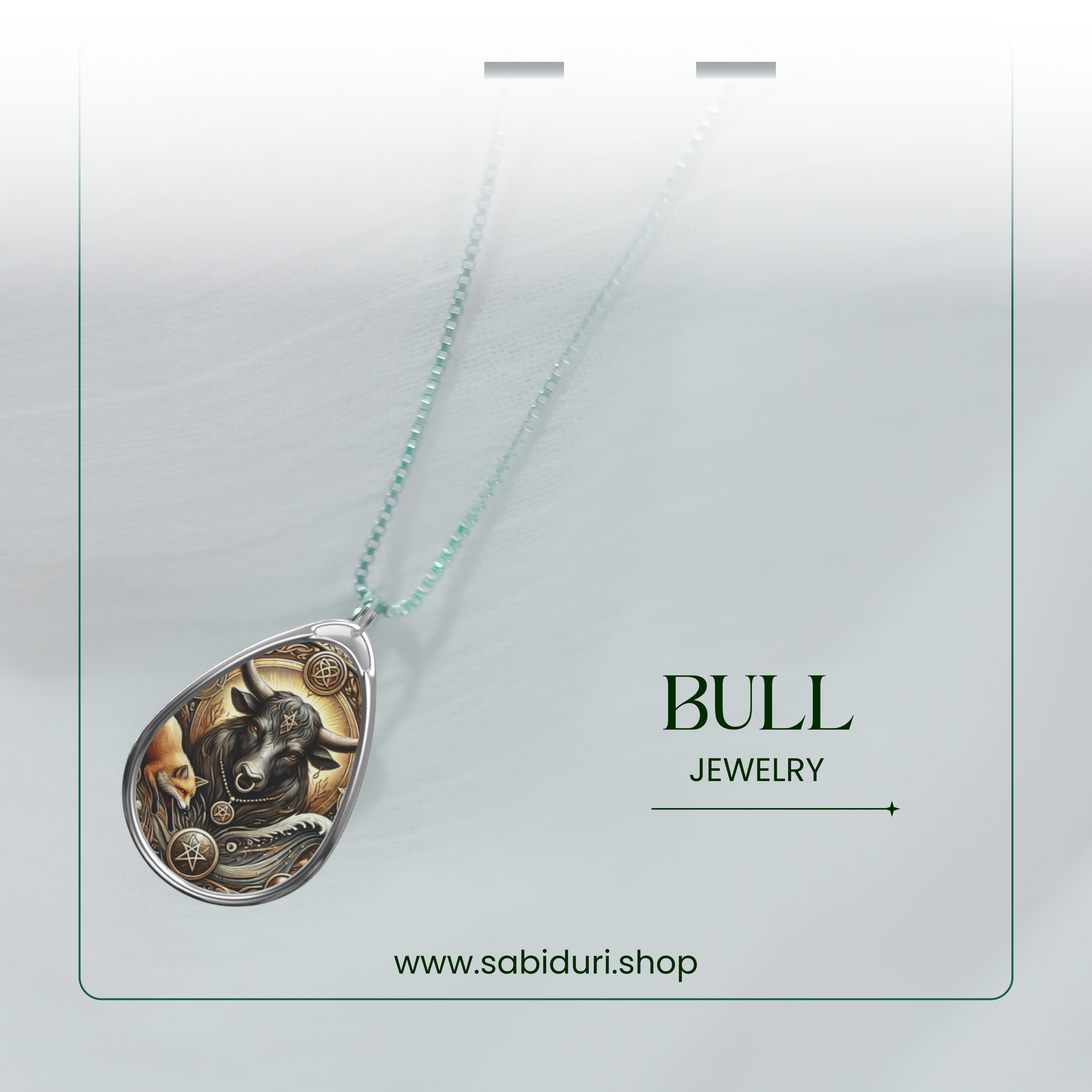 A close-up of a silver albatross pendant necklace, featuring a maritime-themed design with swirling wave patterns and golden accents. The pendant rests on a soft white fabric background, with the words "ALBATROSS JEWELRY" and the website "www.sabiduri.shop" in an elegant green font.