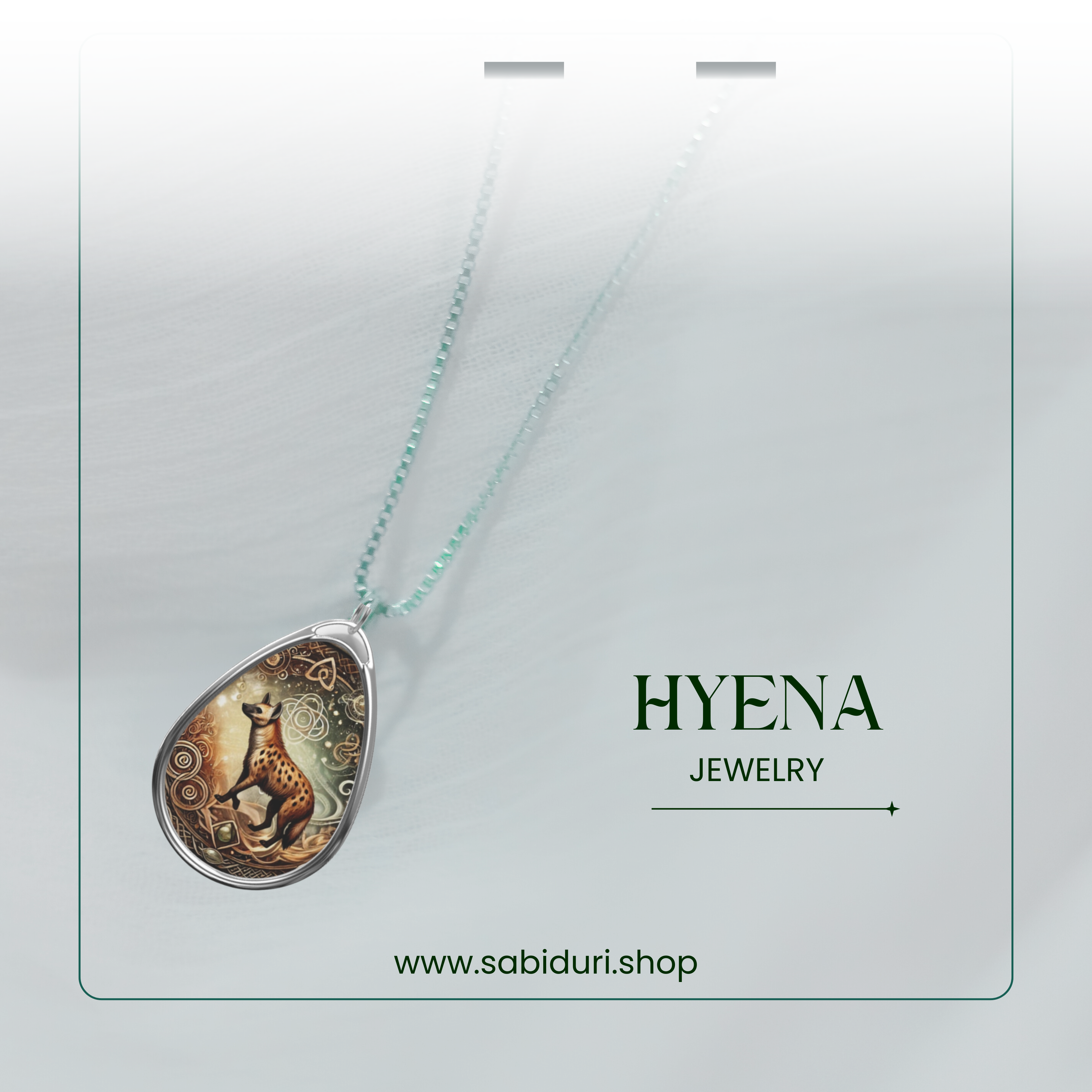 A close-up of the Hyena Spirit Animal necklace, suspended on a delicate chain against a softly blurred white background. The pendant’s design showcases a beautifully detailed hyena with swirling golden patterns, evoking a mystical and spiritual essence.