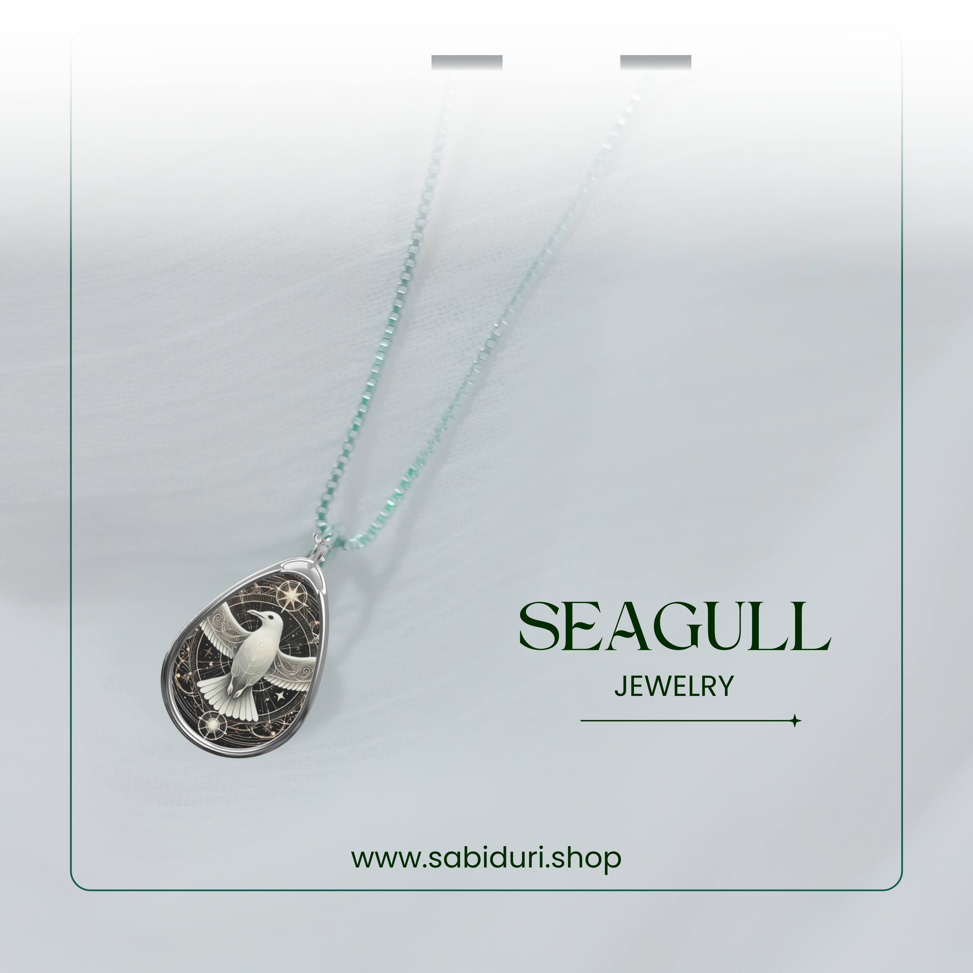 The Seagull Necklace is displayed on a delicate chain against a soft, blurred background. The pendant’s intricate design, featuring a luminous seagull against a dark, starry backdrop, is emphasized. The text "SEAGULL JEWELRY" and "www.sabiduri.shop" is included in the composition.