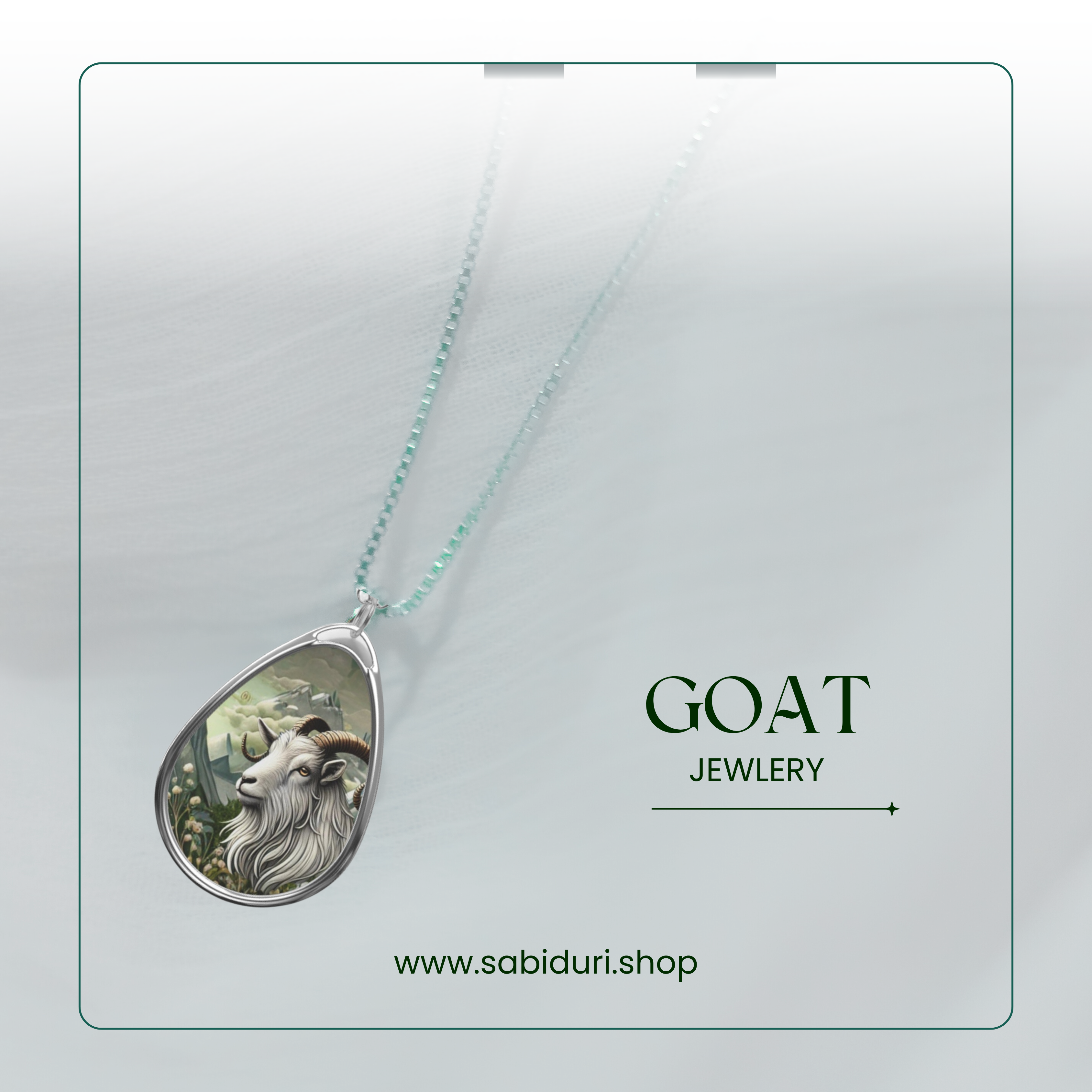 A close-up of a silver necklace with a pendant showcasing a goat spirit animal, representing resilience and curiosity, with the words "GOAT JEWLERY" and the website "www.sabiduri.shop" visible in a minimalist green and white design.