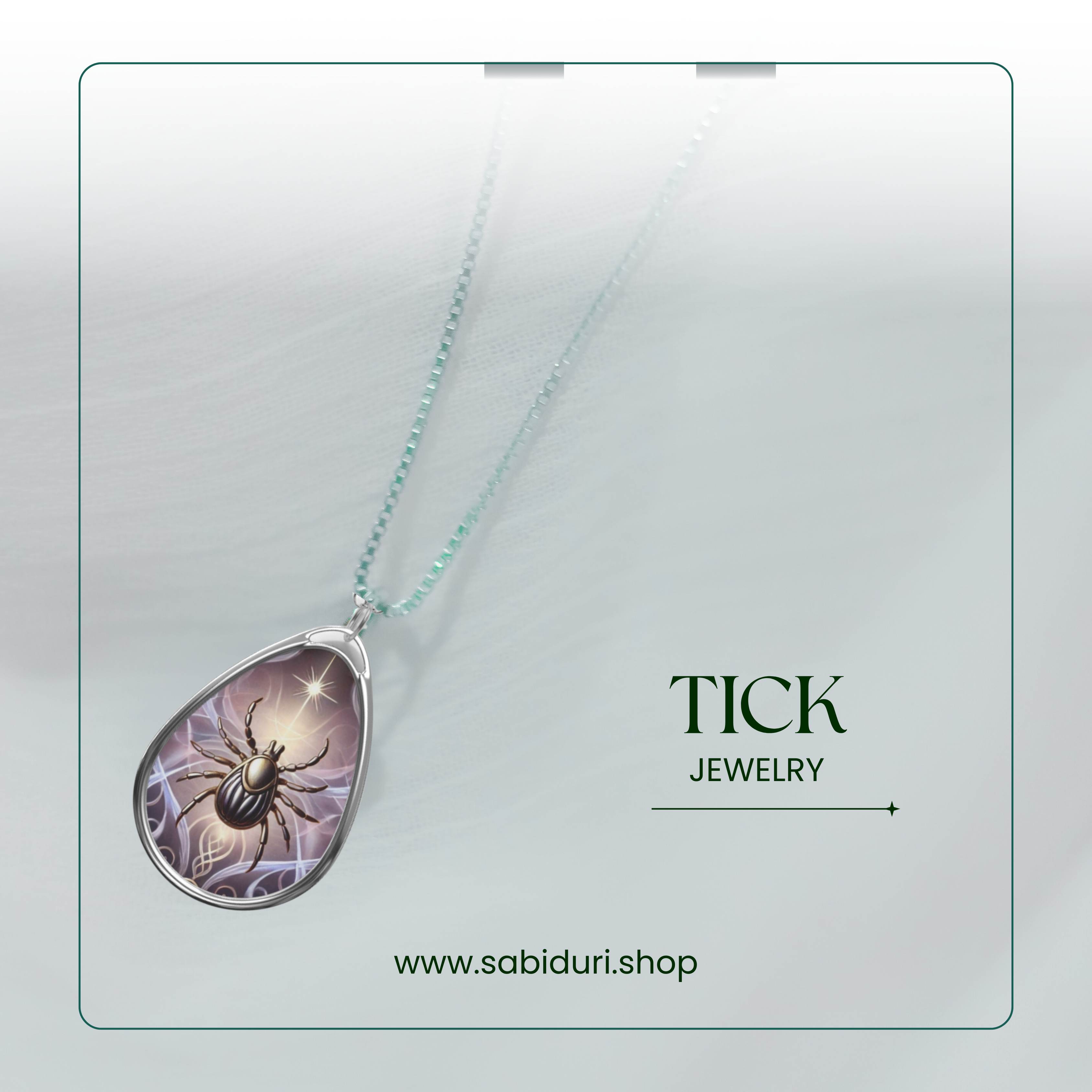 A teardrop-shaped tick necklace with a detailed design of a tick under a star, displayed on a soft, white background with the text 'TICK JEWELRY' and the website 'www.sabiduri.shop'.