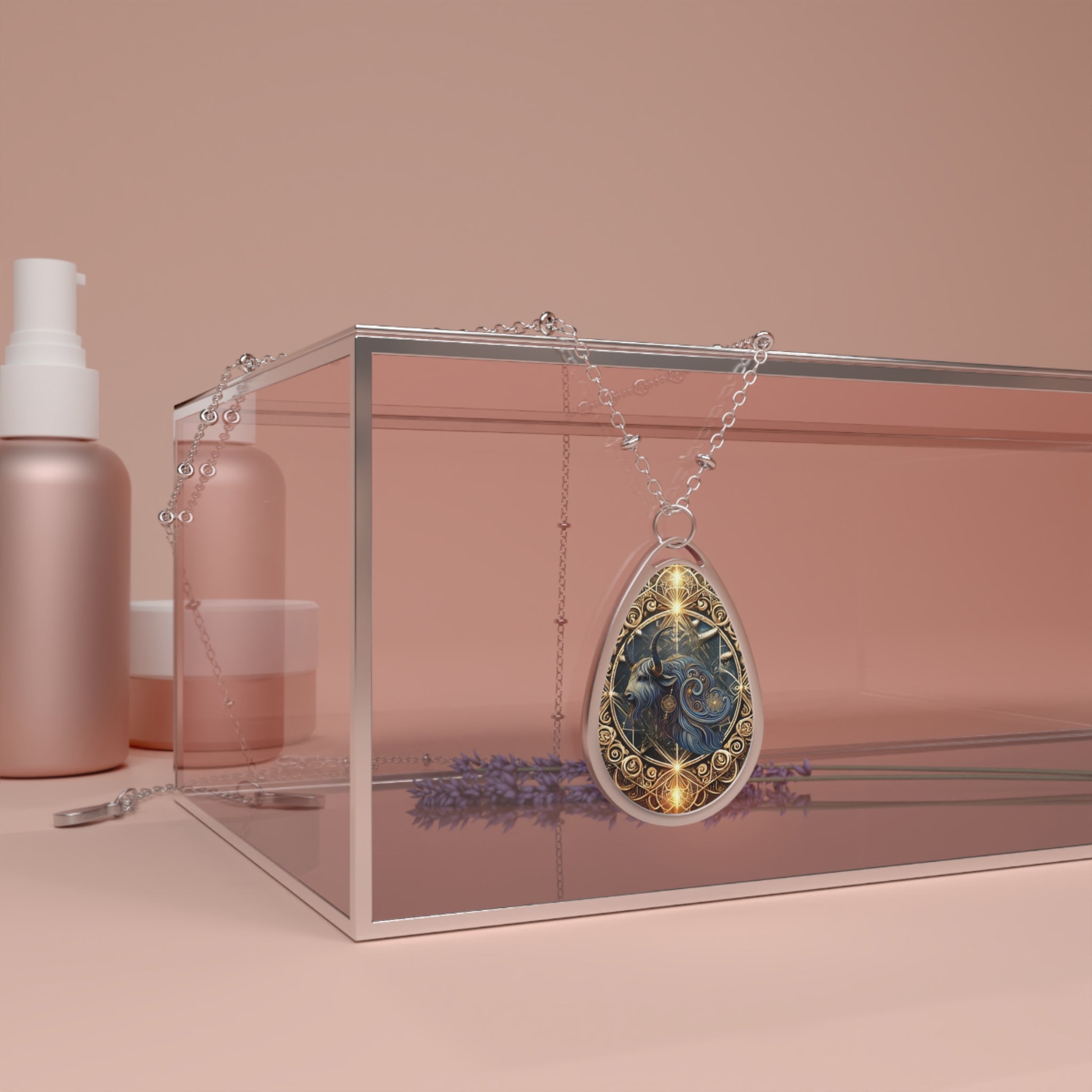 A silver necklace featuring a yak pendant draped over a glass jewelry box with a blush-toned background. The pendant has a deep blue and gold design, reflecting an ornate and mystical aesthetic.