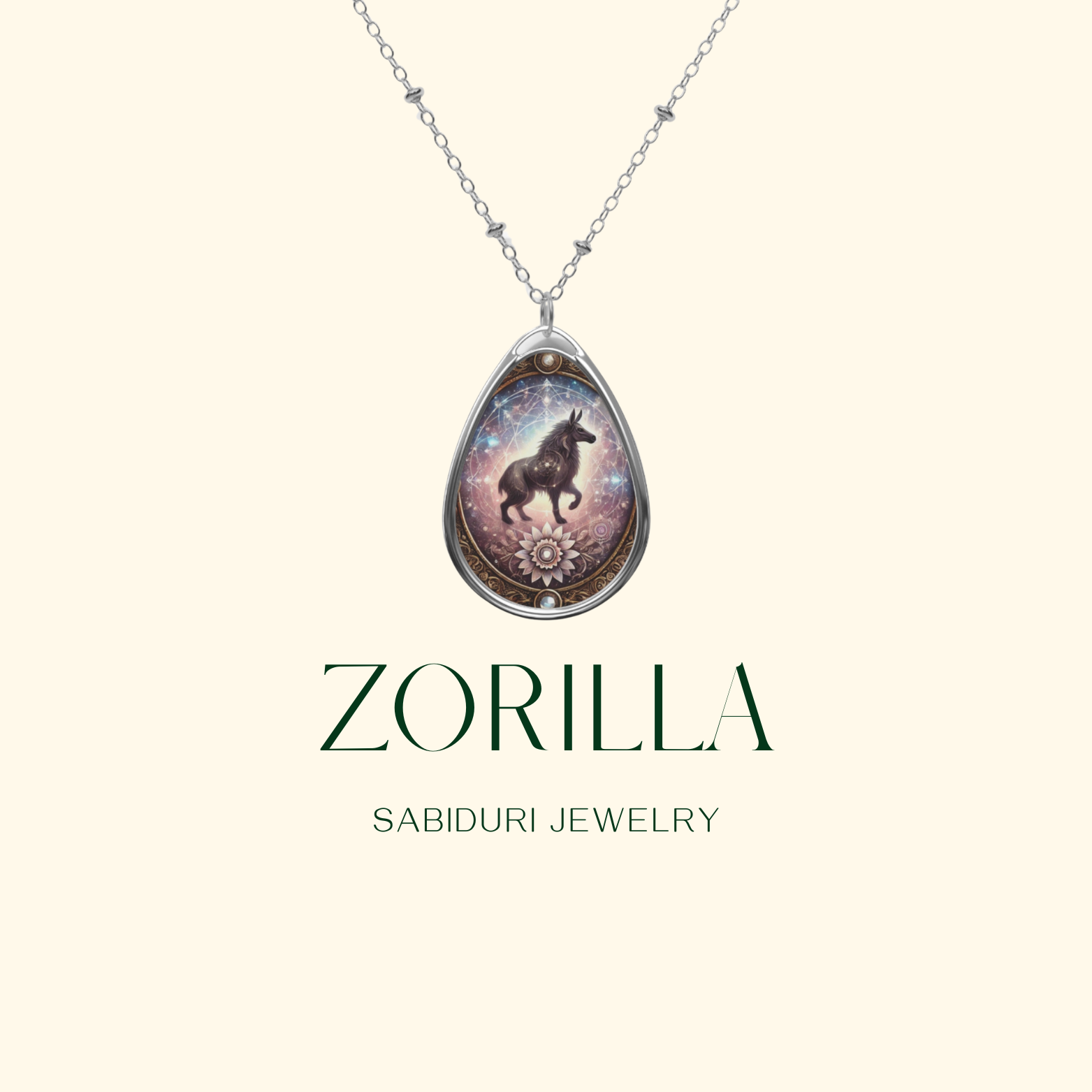 A silver necklace with a ZORILLA-themed pendant, adorned with golden filigree details, suspended against a clean, light-colored background. The text "ZORILLA" and "SABIDURI JEWELRY" is displayed in a modern serif font.